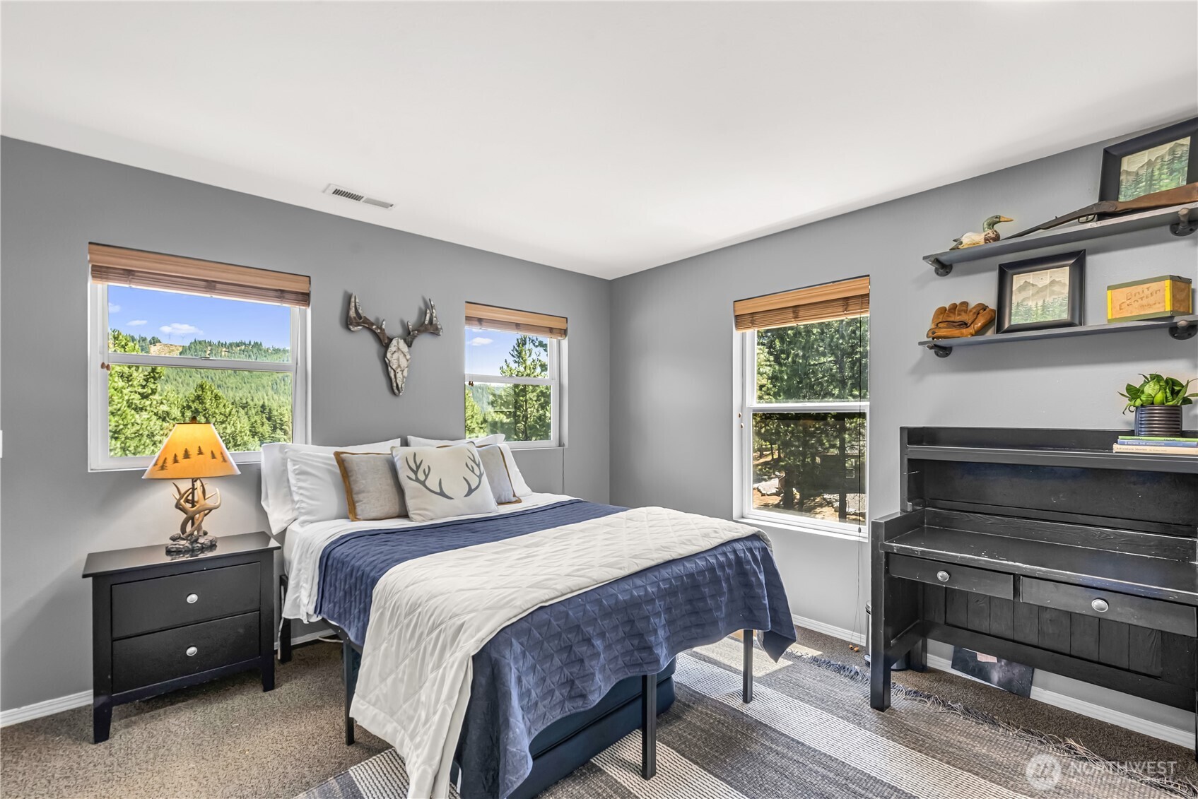 17558 River Road Leavenworth, WA 98826 - Photo 25 of 35 a bedroom with a bed and a window