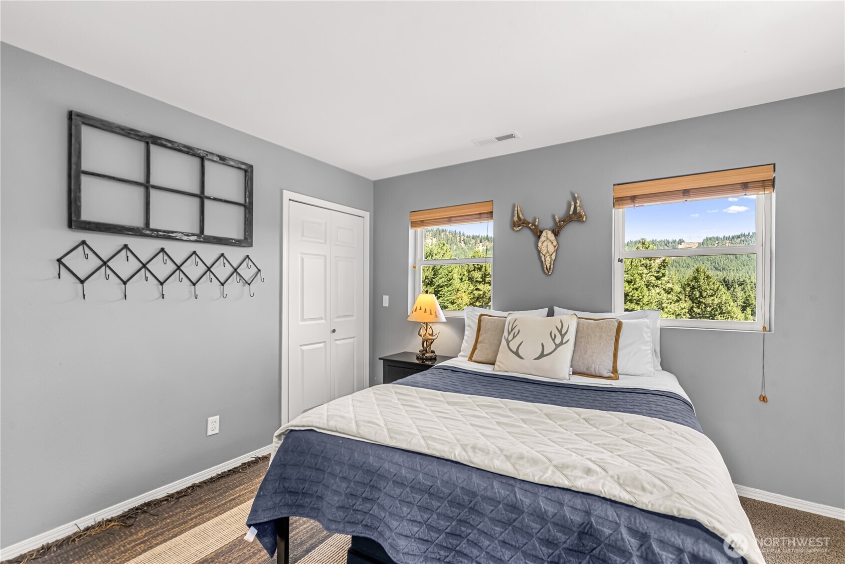 17558 River Road Leavenworth, WA 98826 - Photo 26 of 35 a bedroom with a bed and a window