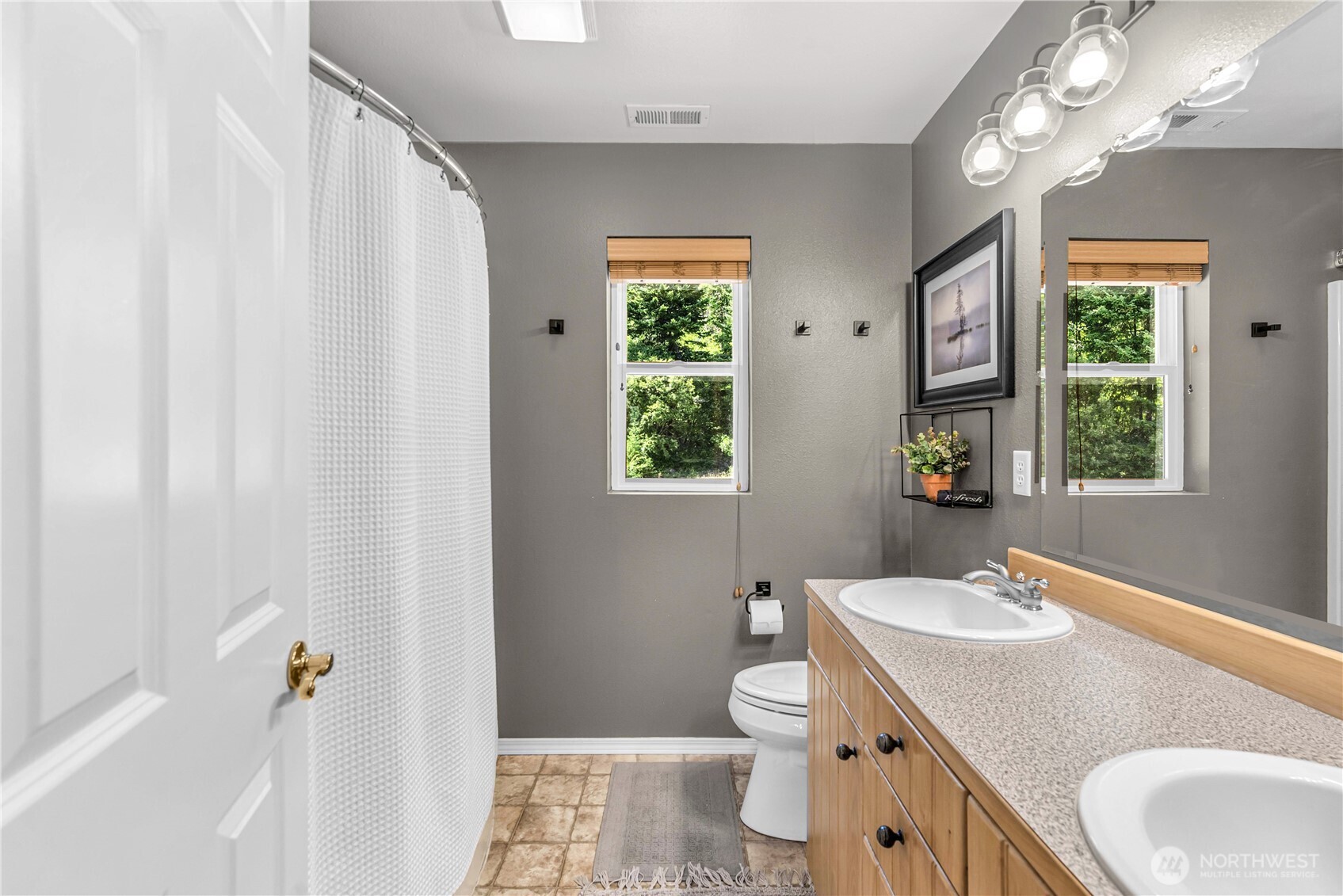 17558 River Road Leavenworth, WA 98826 - Photo 30 of 35 a bathroom with a sink toilet and shower