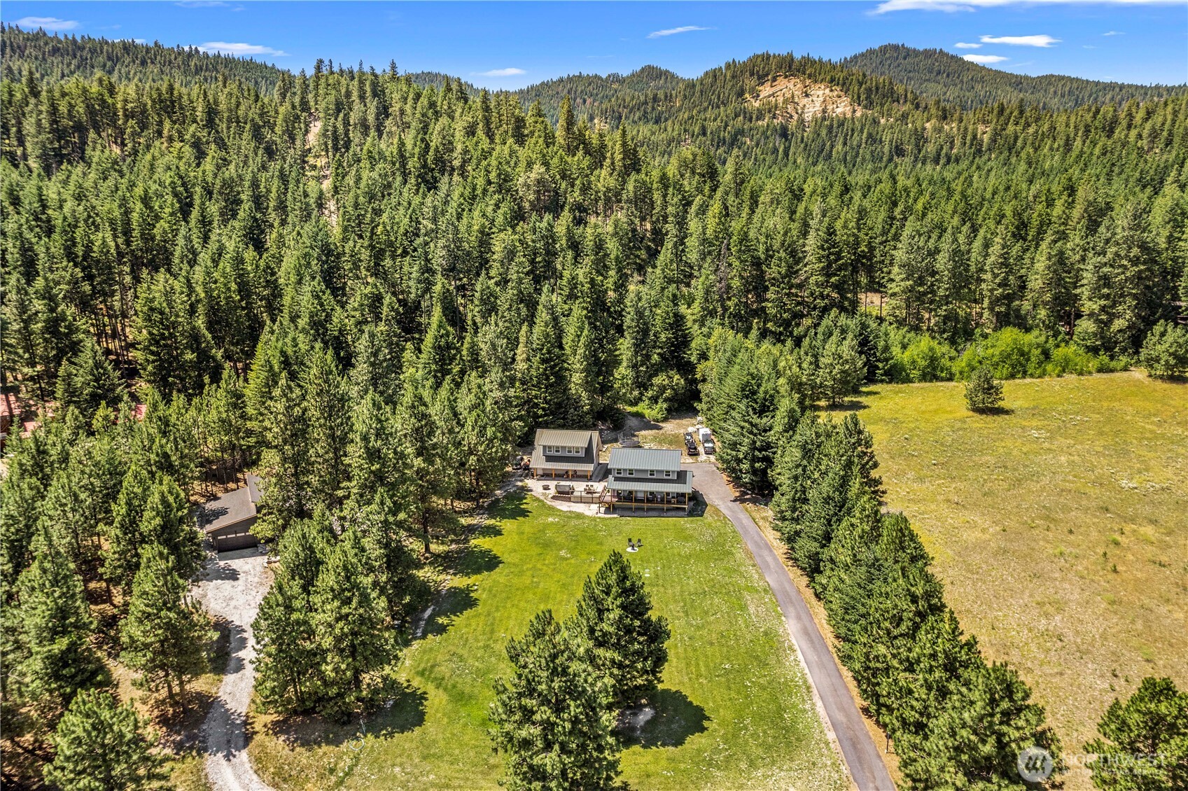 17558 River Road Leavenworth, WA 98826 - Photo 9 of 35 a view of a yard with an outdoor space
