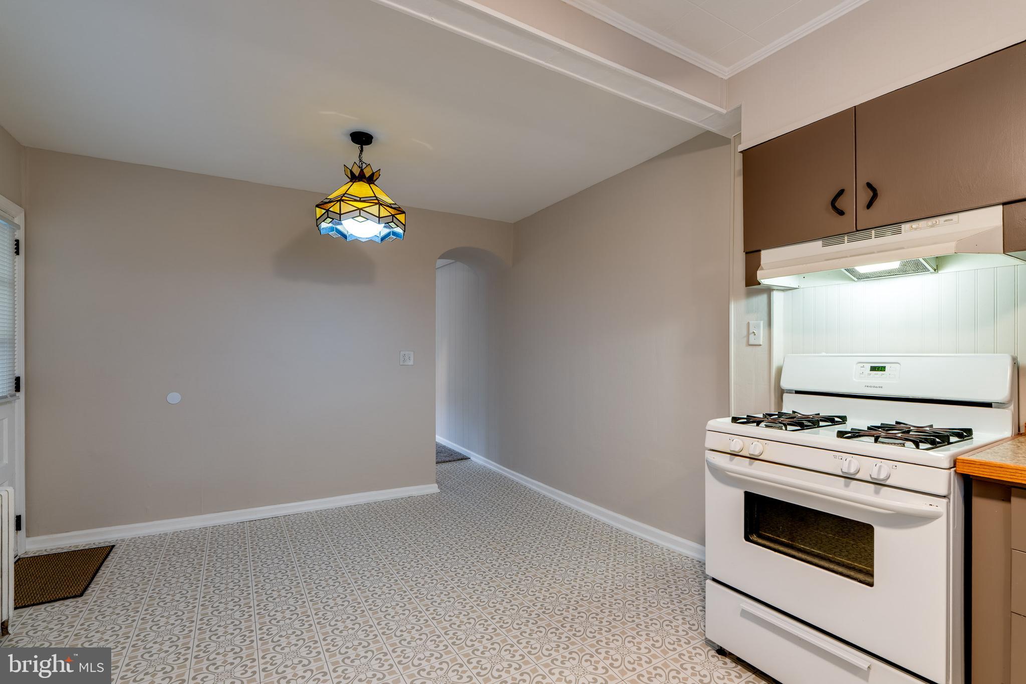 609 Lawn Reading, PA 19609 - Photo 17 of 34 a kitchen with stove and cabinets