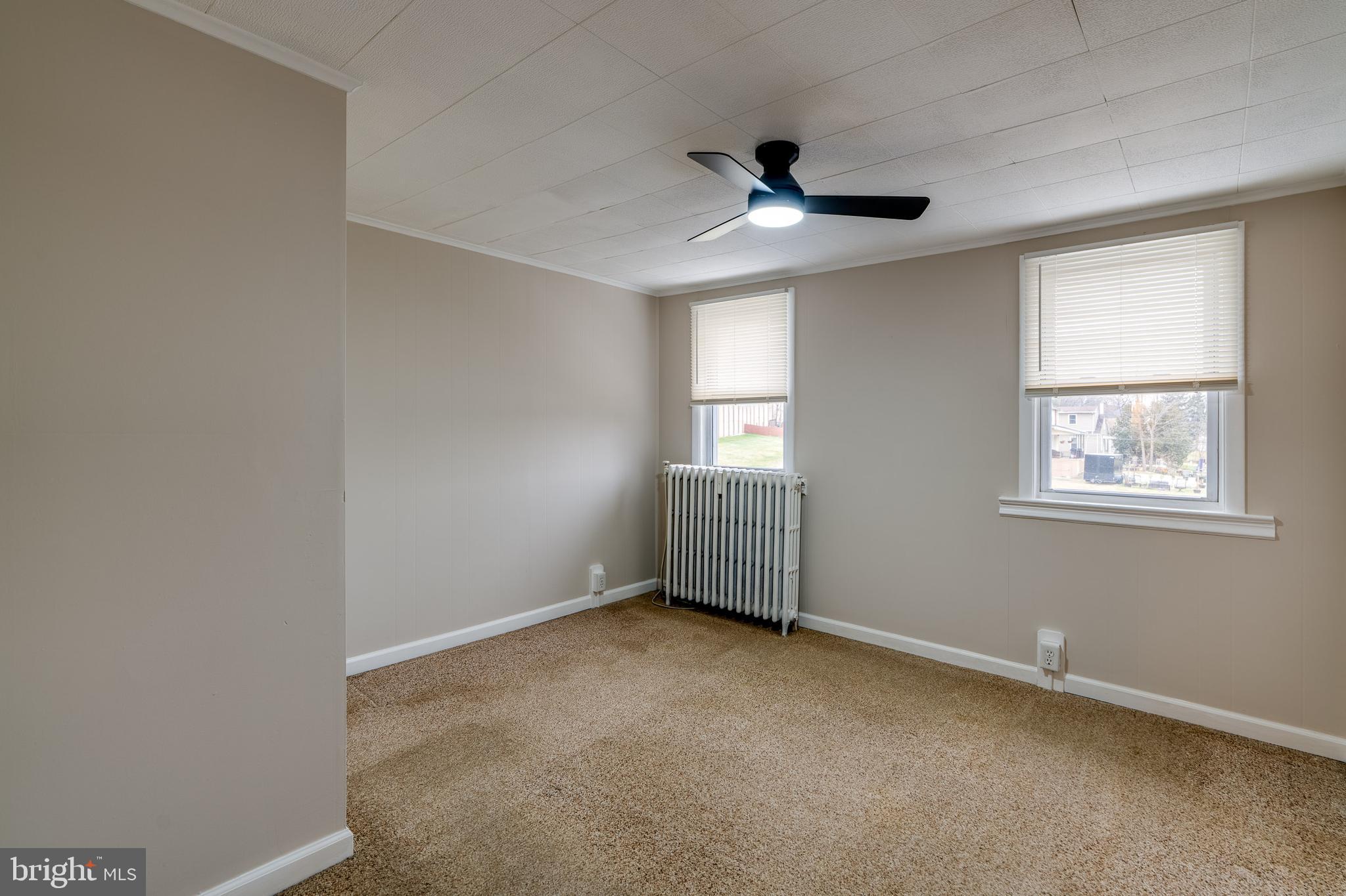 609 Lawn Reading, PA 19609 - Photo 21 of 34 an empty room with windows and fan
