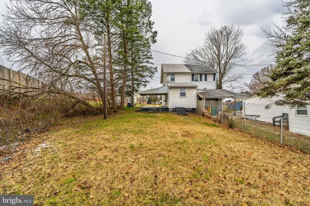 a house view with a yard space