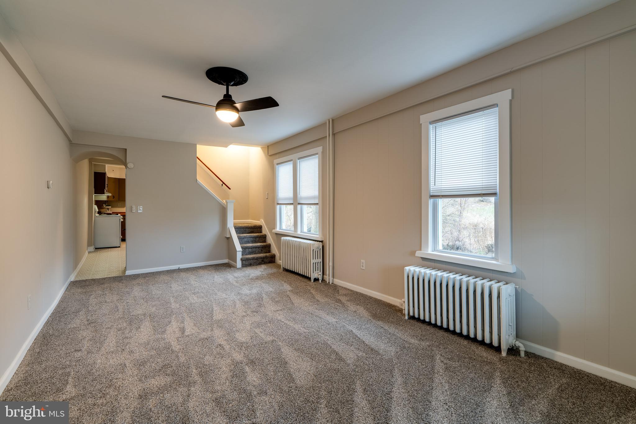 609 Lawn Reading, PA 19609 - Photo 8 of 34 an empty room with windows and ceiling fan