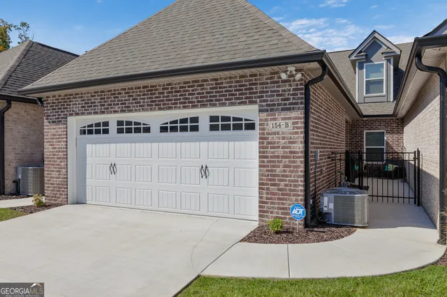 a front view of a house with entertaining space