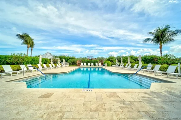 a view of a swimming pool and a terrace