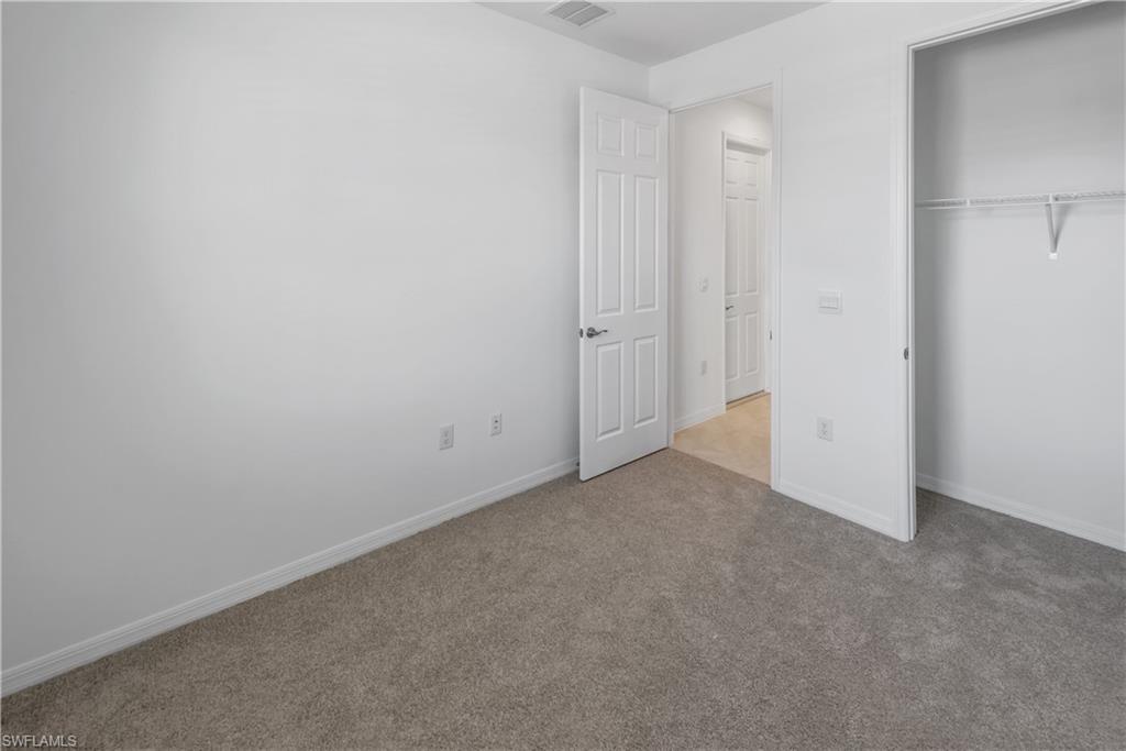 1093 Tranquil Brook Drive Naples, FL 34114 - Photo 14 of 22 a view of an empty room