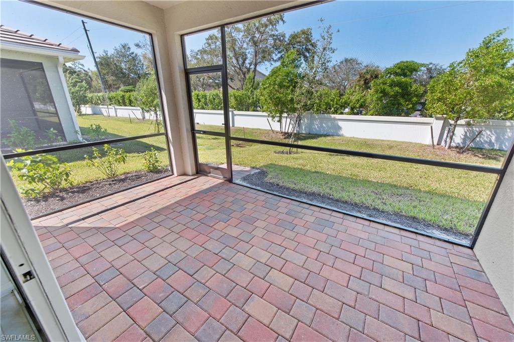 1093 Tranquil Brook Drive Naples, FL 34114 - Photo 18 of 22 a view of a two yard from a balcony