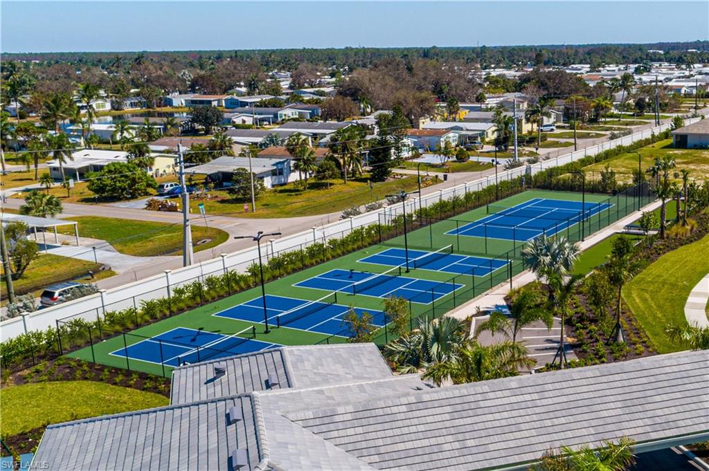 1093 Tranquil Brook Drive Naples, FL 34114 - Photo 21 of 22 a view of a city