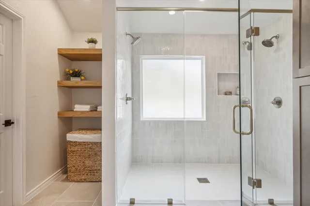 a view of garden with flowers and trees