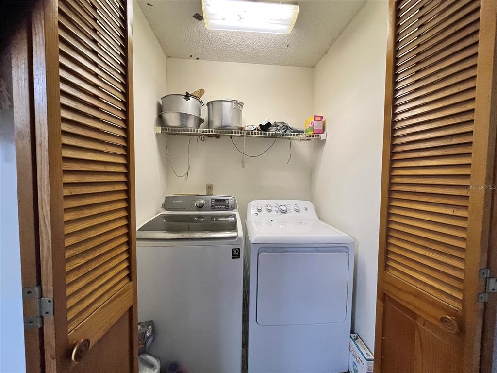14182 Southwest 161st Street Brooker, FL 32622 - Photo 20 of 20 a utility room with dryer and washer