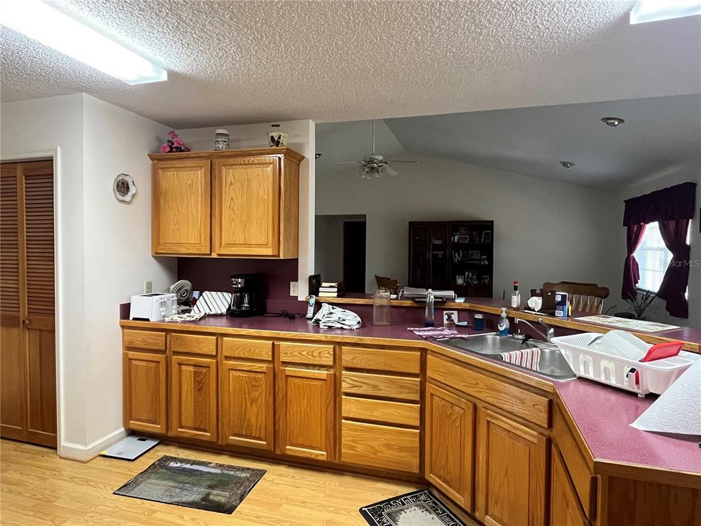 14182 Southwest 161st Street Brooker, FL 32622 - Photo 10 of 20 a room with sink mirror and furniture