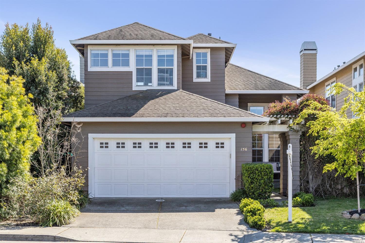 156 Baypoint Drive San Rafael, CA 94901 - Photo 1 of 1 a front view of a house with a garden