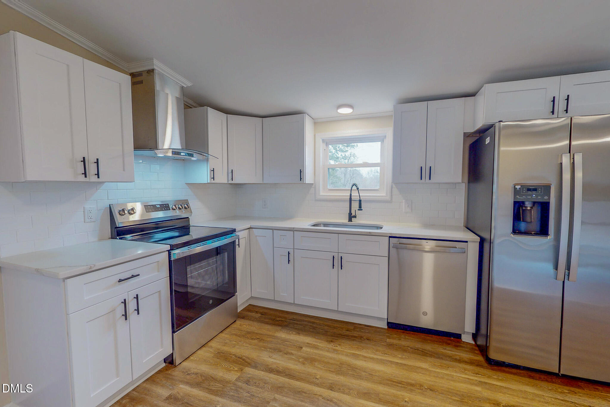 67 Halifax Road Roxboro, NC 27574 - Photo 13 of 48 a kitchen with stainless steel appliances granite countertop a refrigerator sink and microwave