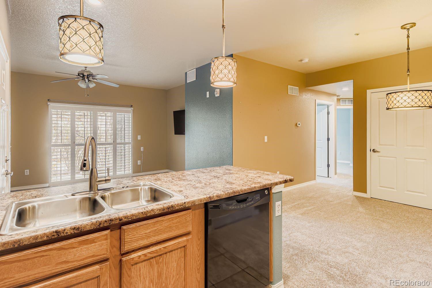 8779 South Kipling Way, Unit 106 Littleton, CO 80127 - Photo 3 of 20