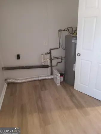 a view of a room with rack on the wall