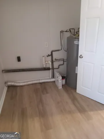 a view of a room with rack on the wall