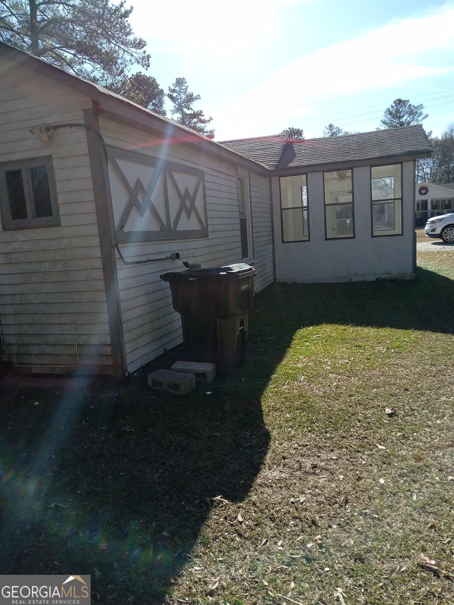 1186 Eastview Road Northeast Conyers, GA 30012 - Photo 3 of 20 a view of a back yard of the house