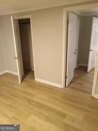 a view of entryway with wooden floor
