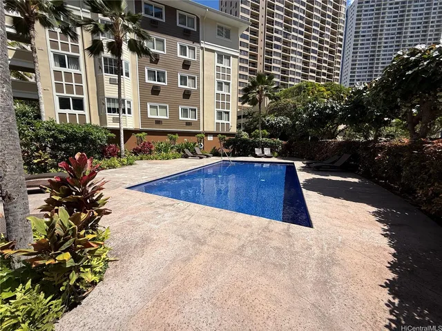 a view of a building with a garden