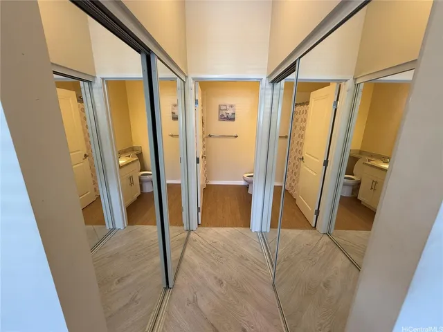 a bathroom with a tub and shower