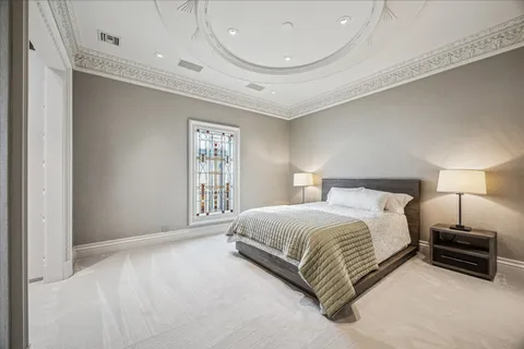 a view of a hallway with a door and couch