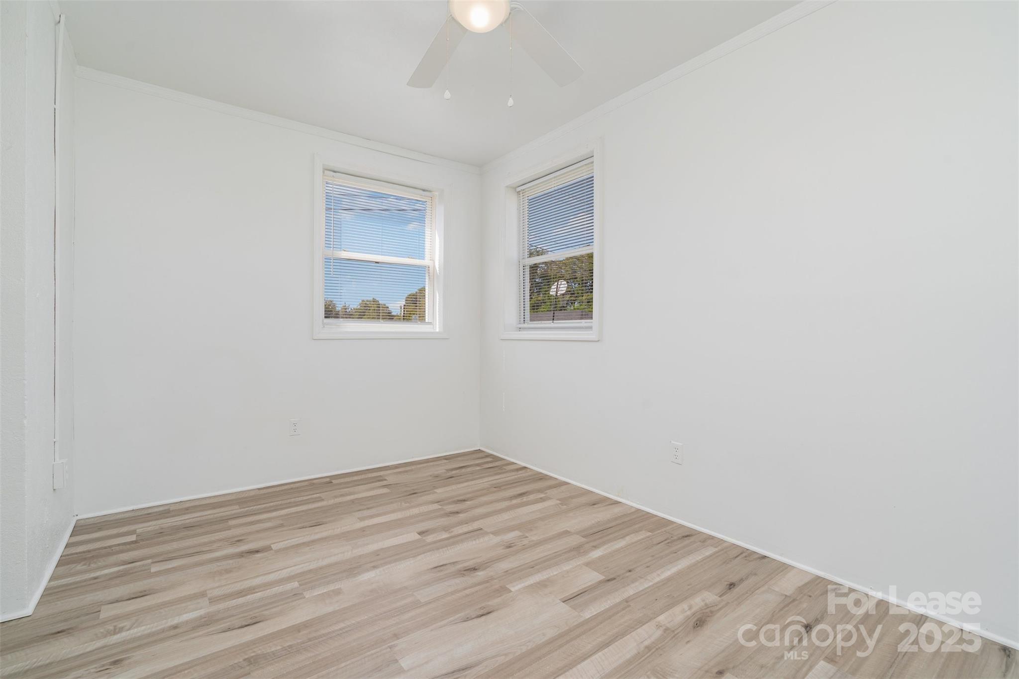200 York Street, Unit F2 Chester, SC 29706 - Photo 10 of 16 a view of empty room with wooden floor