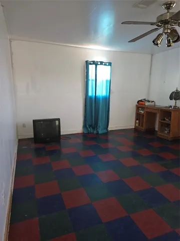 a bathroom with a toilet and a bathtub