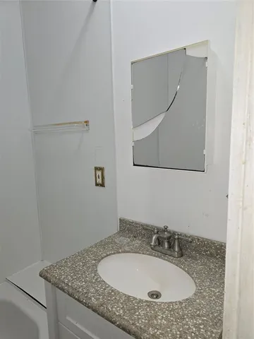 a room with furniture and chandelier