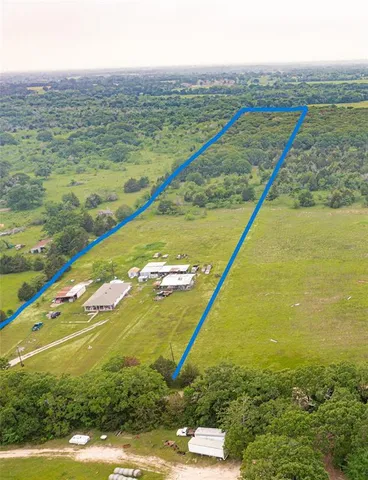 a view of a house with a swimming pool