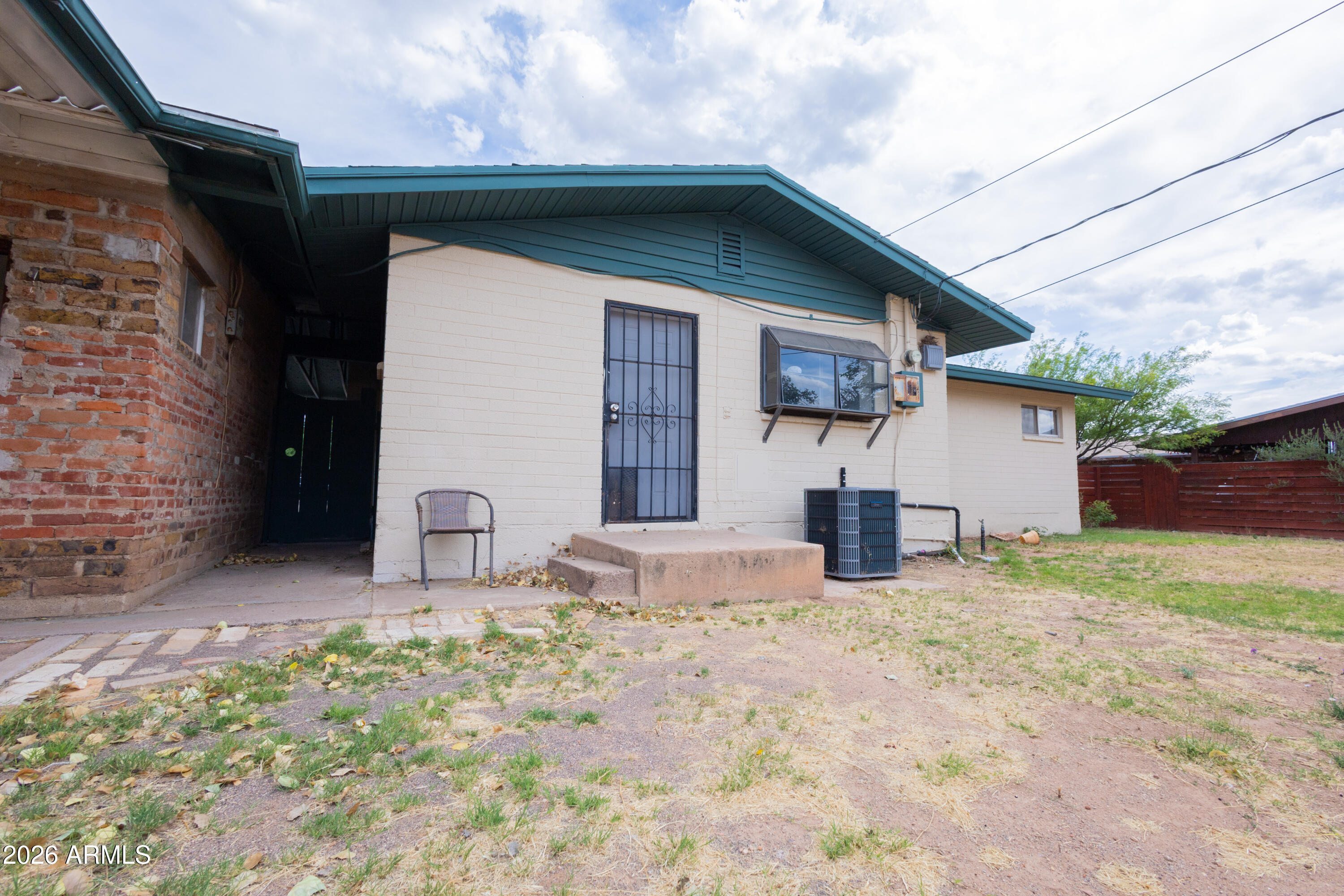 1626 11th Street Douglas, AZ 85607 - Photo 25 of 30 a view of a house with backyard and trees