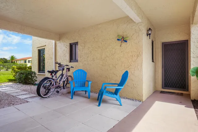 a view of house with chair and tables