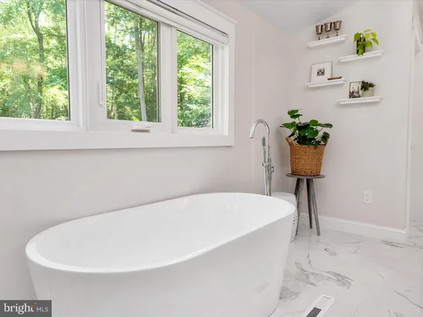 a front view of a house with a porch