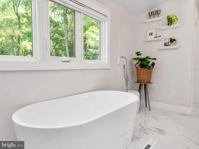 a front view of a house with a porch