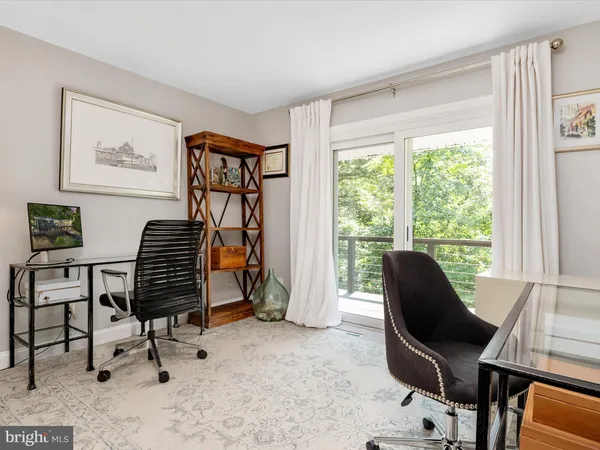 a view of balcony with wooden floor