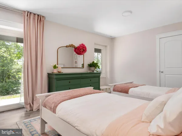 a view of a lake with chairs