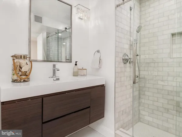 a view of a swimming pool with a lounge chairs