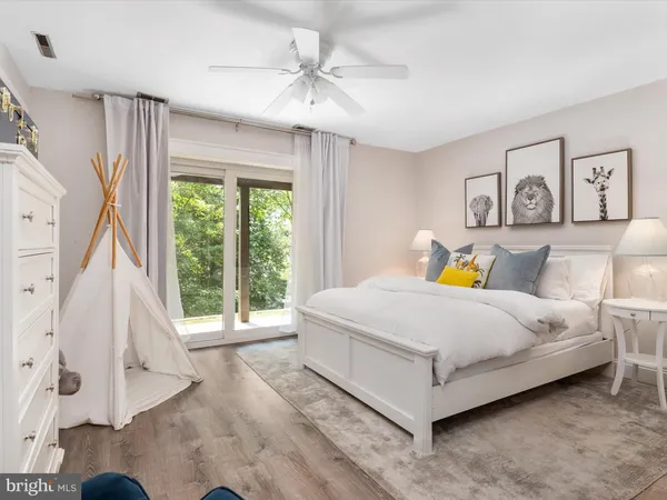 a view of a lake with outdoor seating