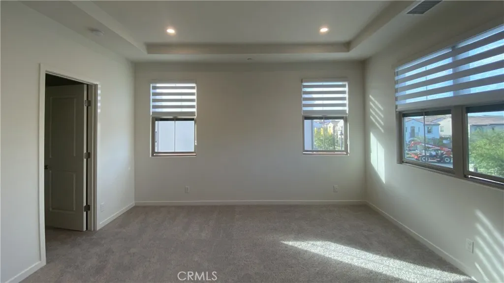 110 Sunnyside Irvine, CA 92620 - Photo 11 of 15 an empty room with windows