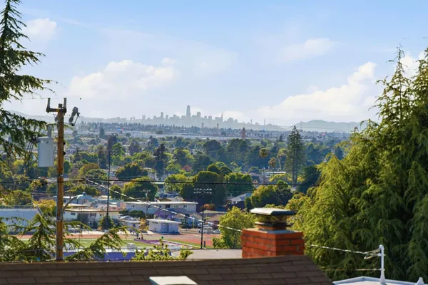 a view of a city with tall buildings
