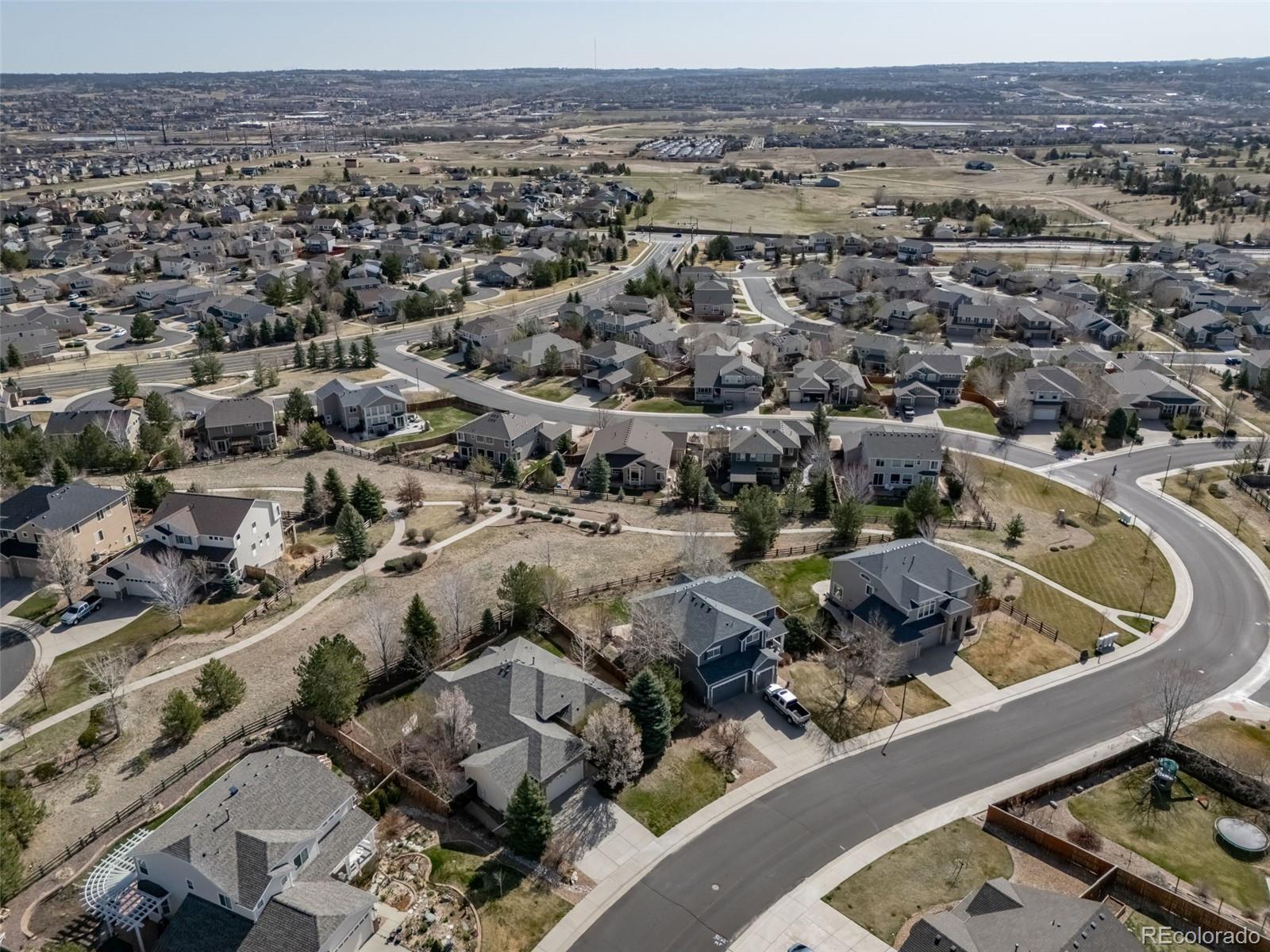 16598 Hitching Post Circle Parker, CO 80134 - Photo 44 of 50 an aerial view of a house with a outdoor space
