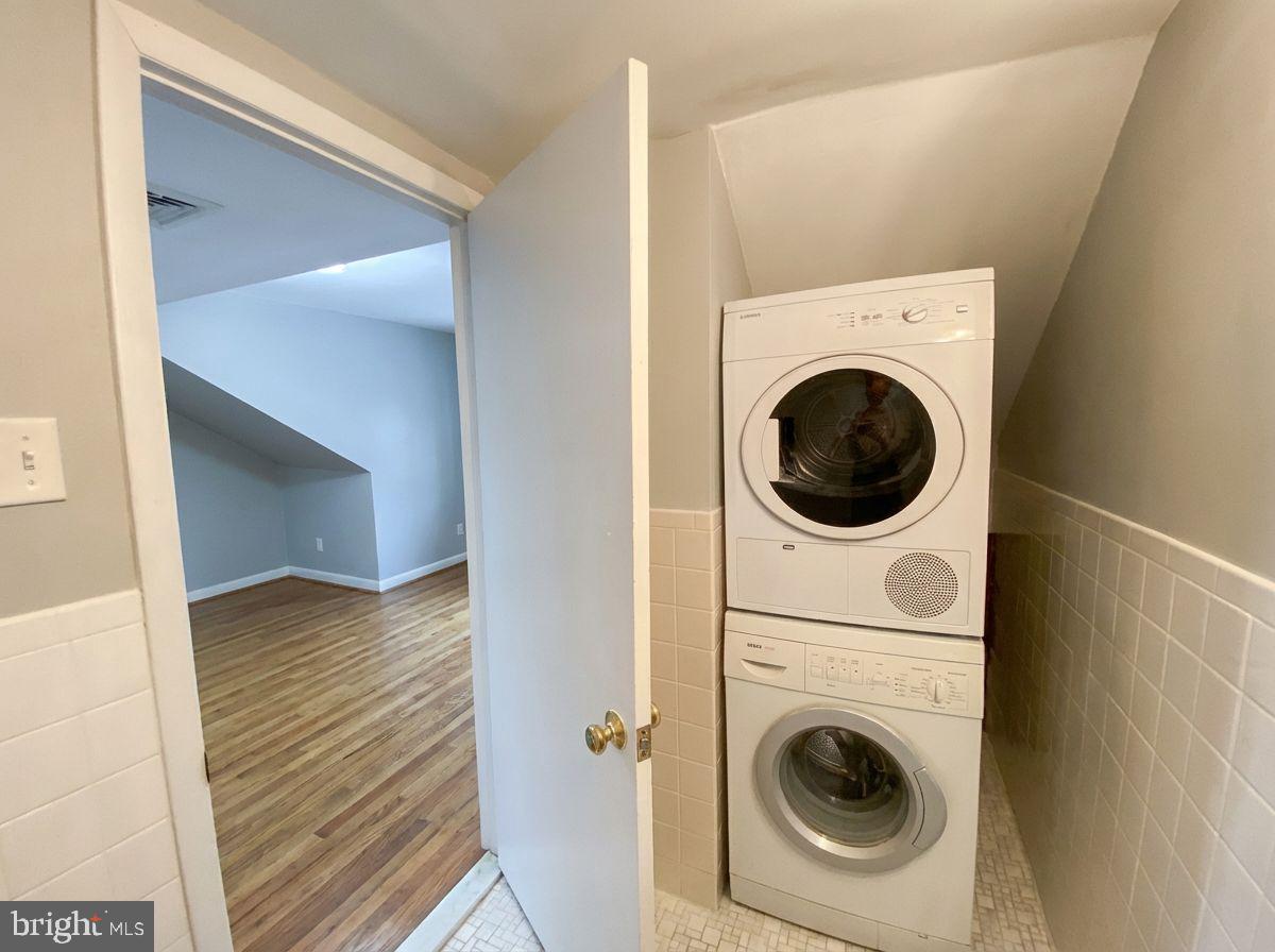 713 Walnut Street, Unit 3F Philadelphia, PA 19106 - Photo 5 of 12 a view of a hallway with washer and dryer