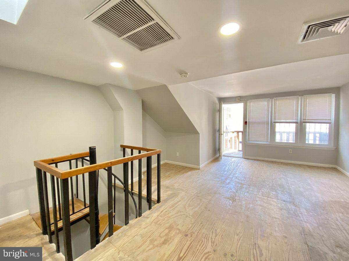 713 Walnut Street, Unit 3F Philadelphia, PA 19106 - Photo 6 of 12 a view of entryway and hall with wooden floor