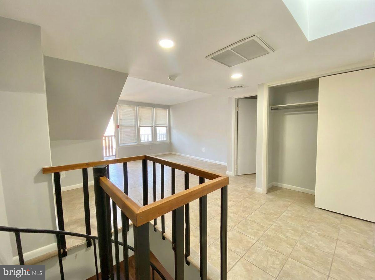 713 Walnut Street, Unit 3F Philadelphia, PA 19106 - Photo 7 of 12 a view of an entryway with wooden floor