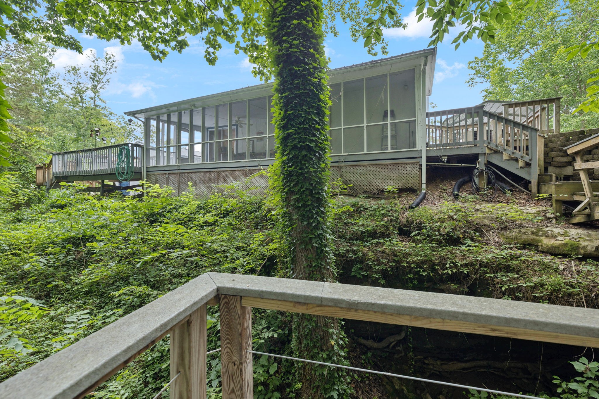 a view of a wooden fence and a window
