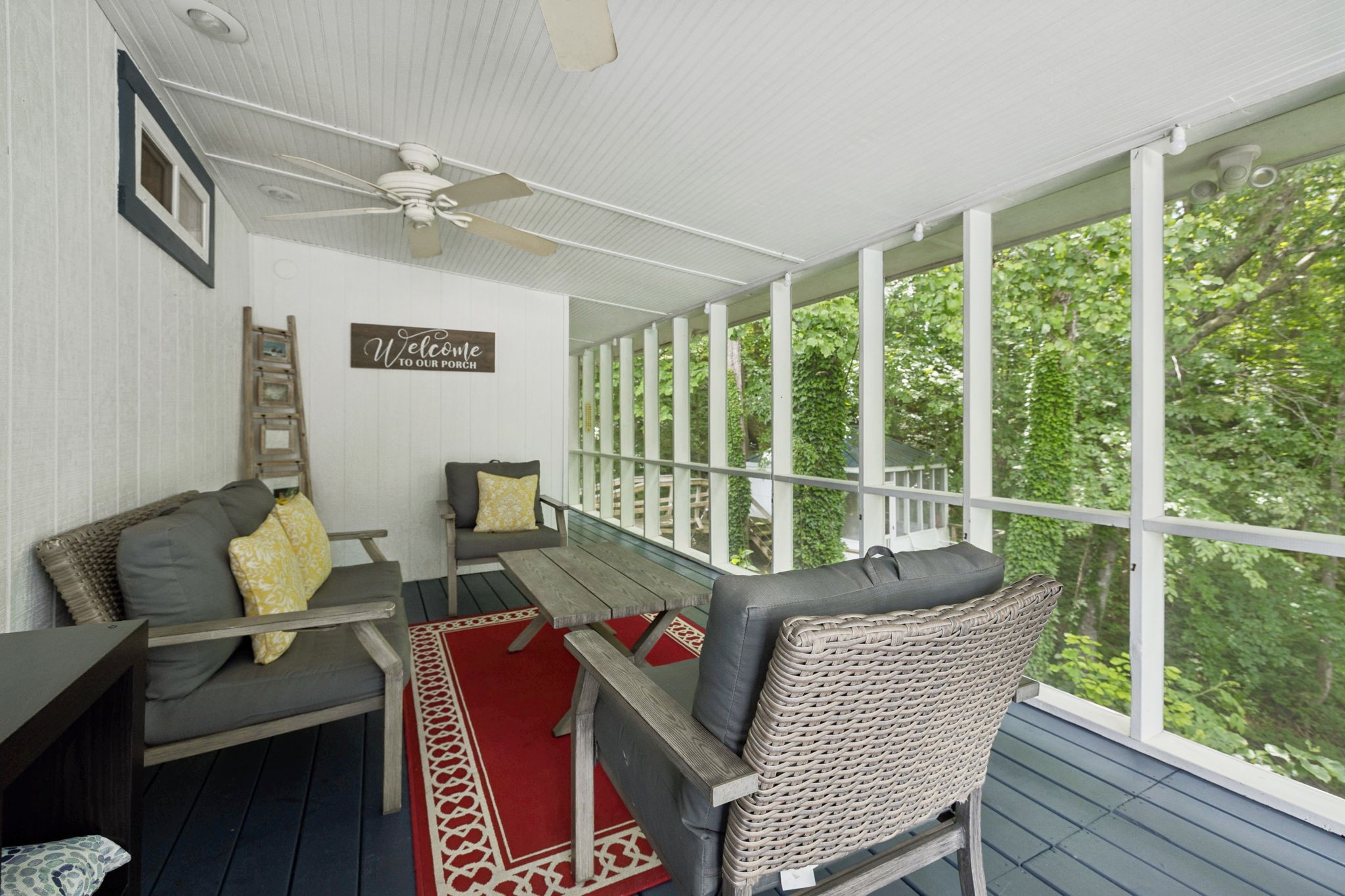 617 Still Point Road Smithville, TN 37166 - Photo 22 of 72 a living room with furniture and a floor to ceiling window