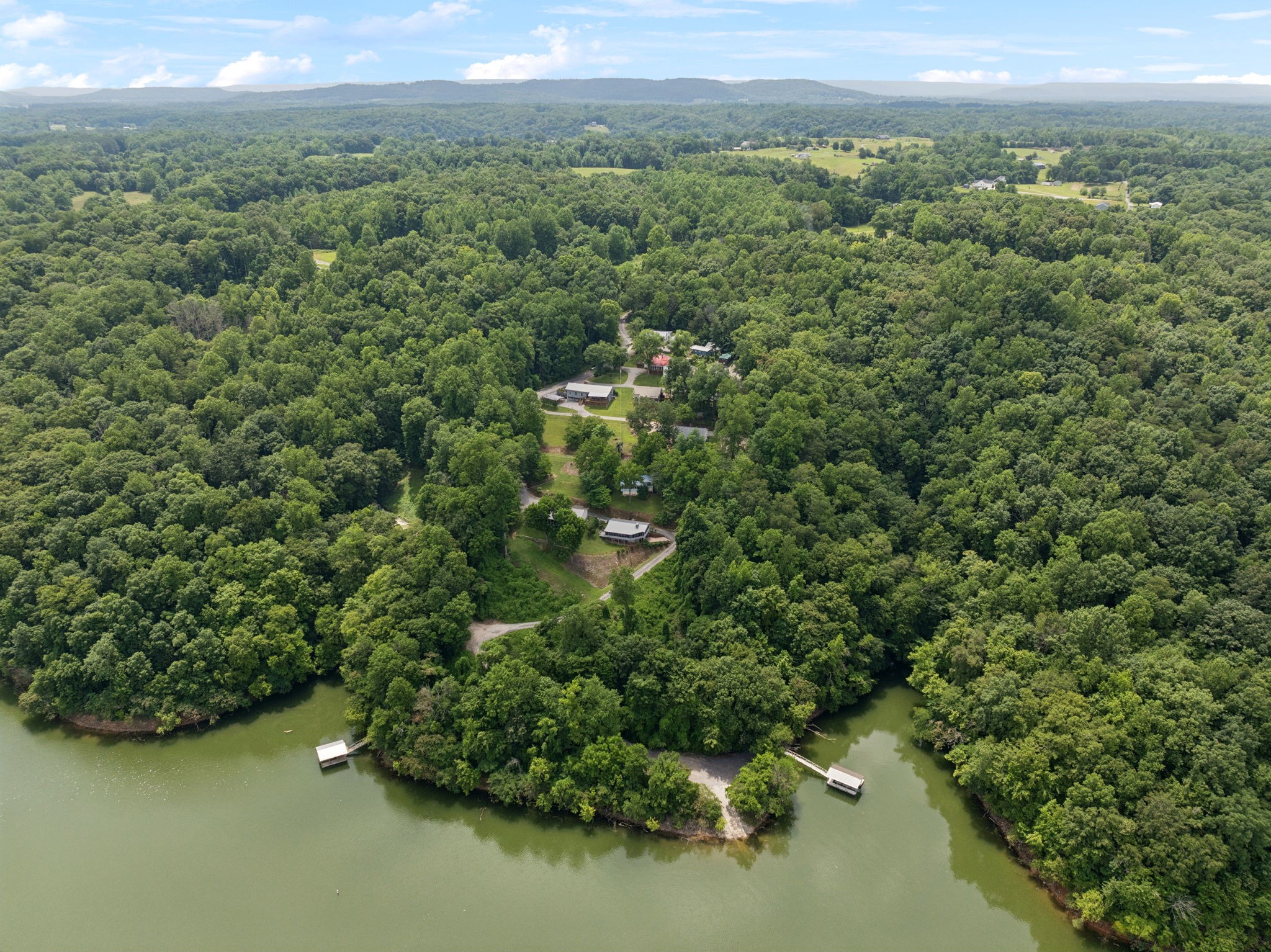 617 Still Point Road Smithville, TN 37166 - Photo 69 of 72 a view of a city with lush green forest