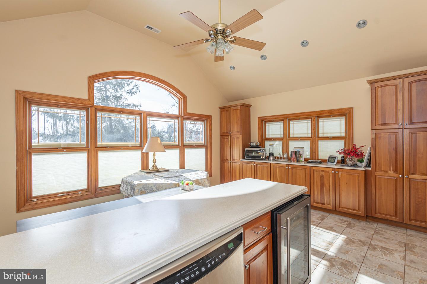 612 Double Woods Road Langhorne, PA 19047 - Photo 17 of 44 a large kitchen with stainless steel appliances wooden floor and a large window