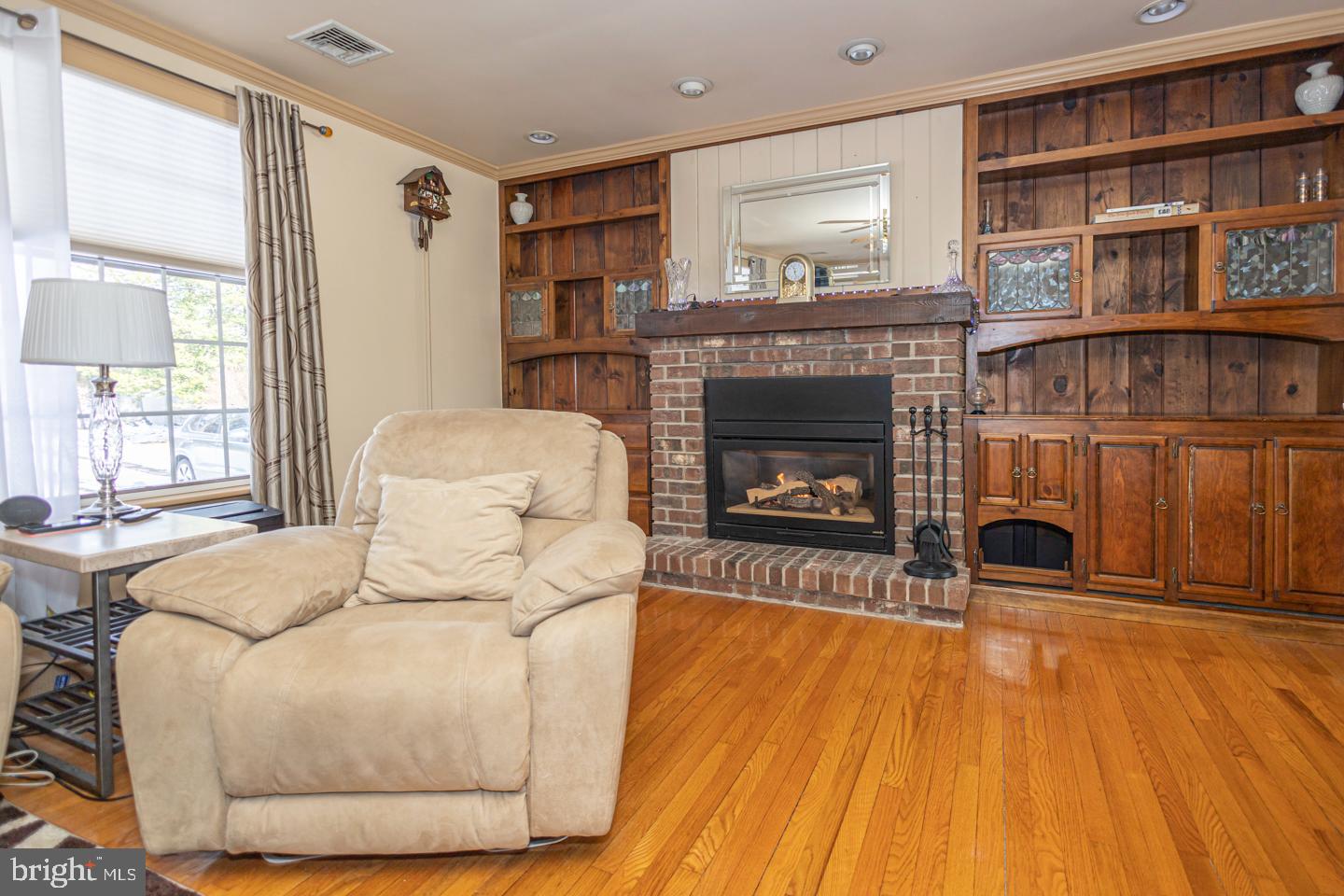 612 Double Woods Road Langhorne, PA 19047 - Photo 22 of 44 a bedroom with a bed and a fireplace