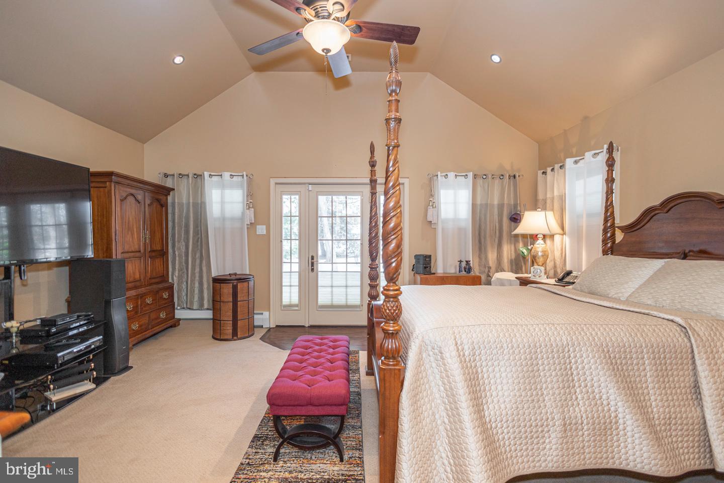 612 Double Woods Road Langhorne, PA 19047 - Photo 25 of 44 a bedroom with a bed dresser and a flat tv screen